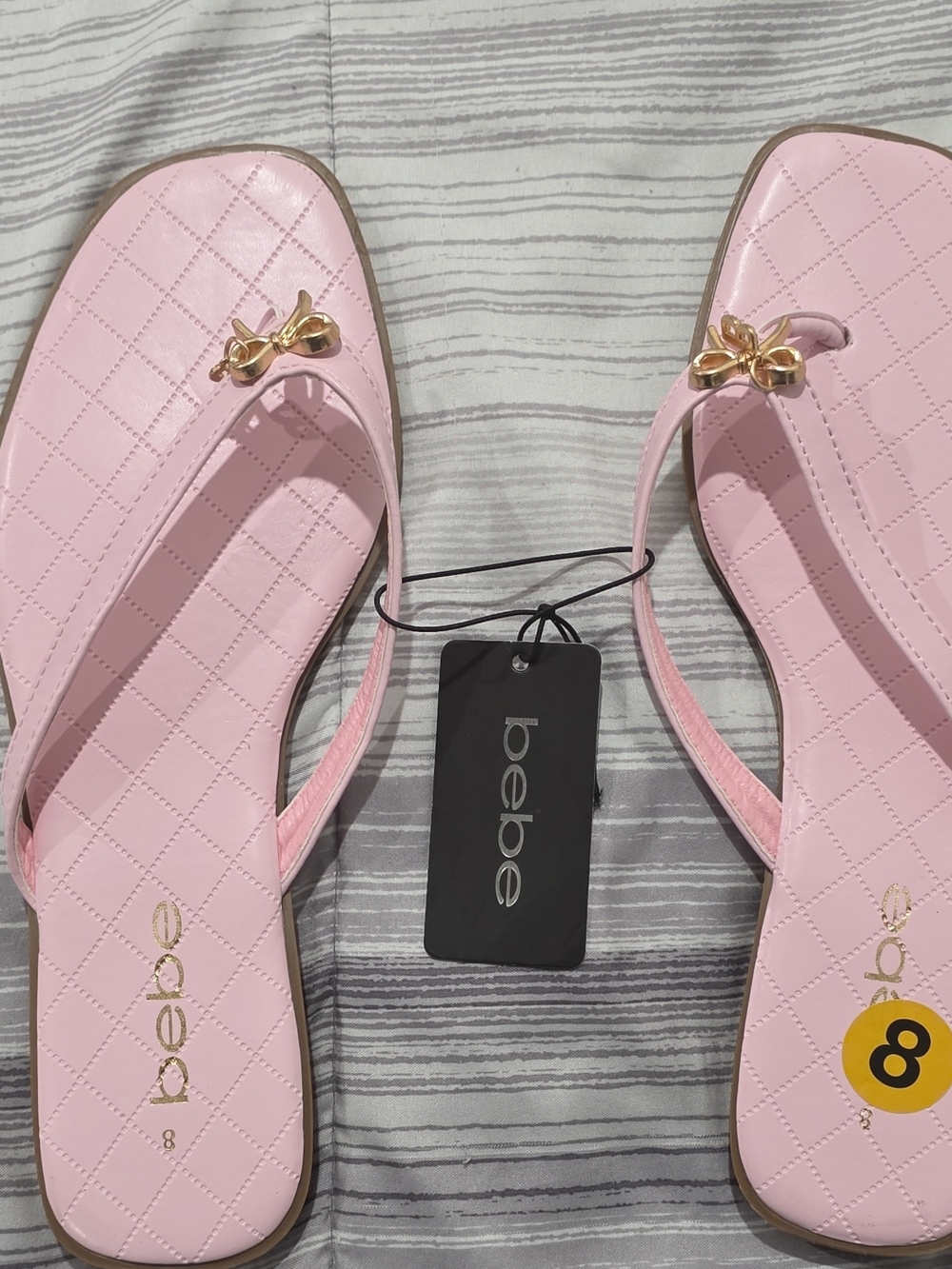 bebe Pink Quilted Flip Flop Sandals with Gold Bow